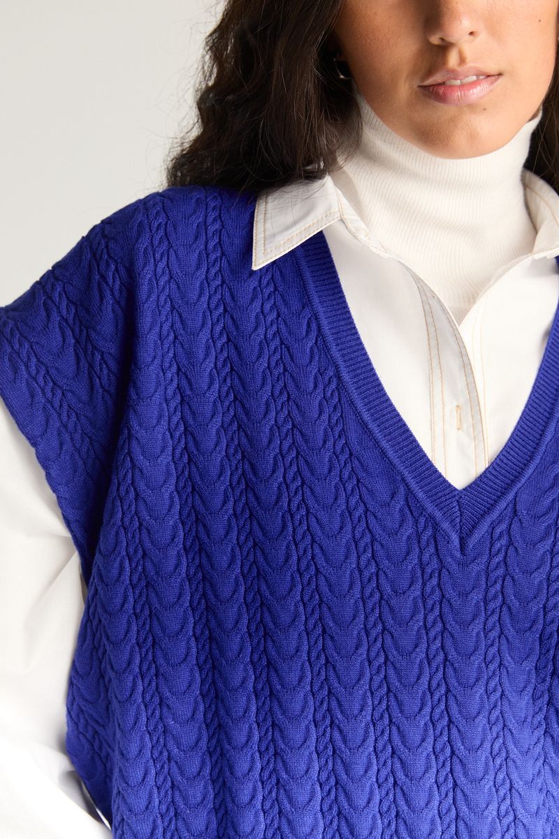 SWEATER VEST OVER CABLES