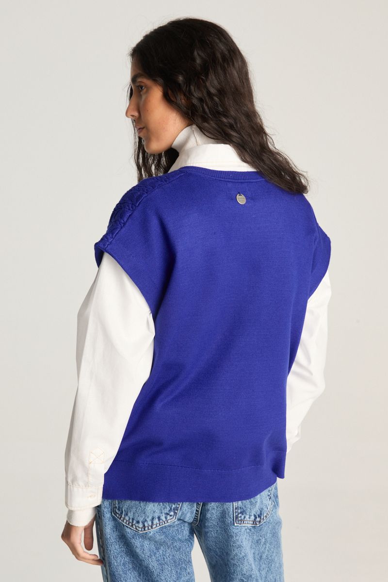SWEATER VEST OVER CABLES